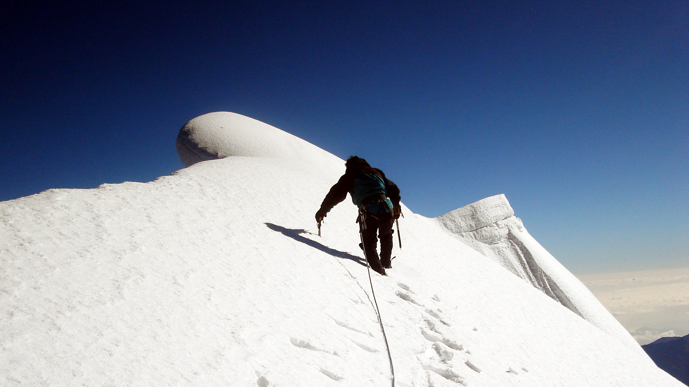 Arriving at the illampu Summit